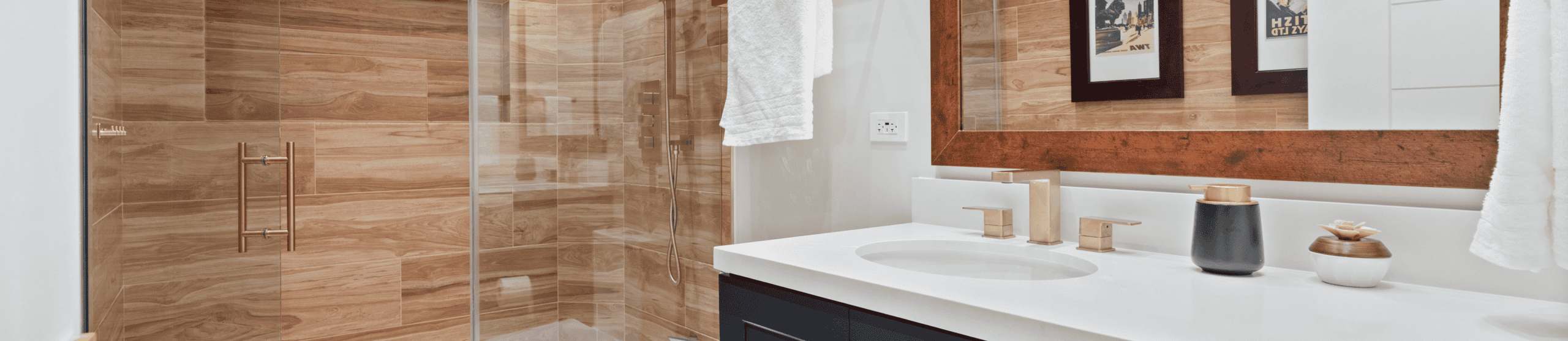 Modern bathroom with wooden accents, glass shower, and white vanity for luxury home decor.