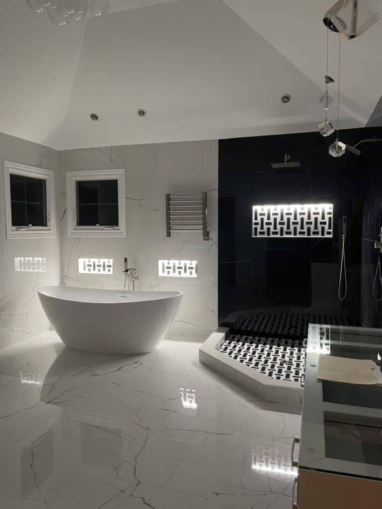 Modern luxury bathroom with freestanding tub and walk-in shower.
