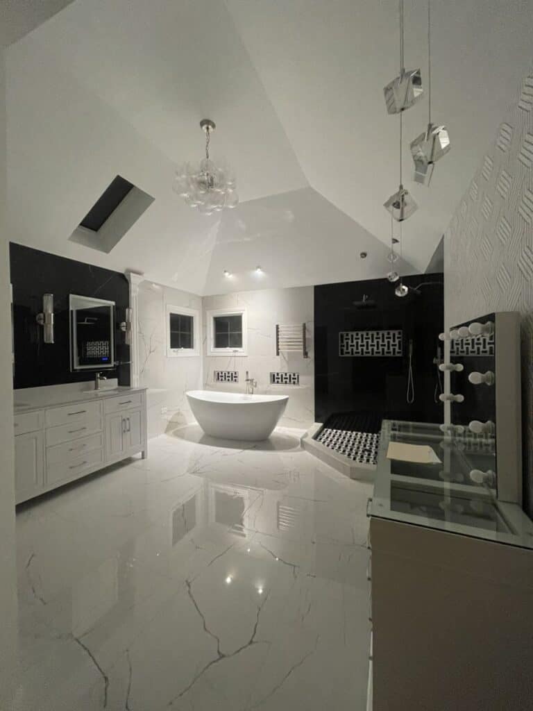 Modern luxury bathroom with freestanding tub and stylish fixtures.